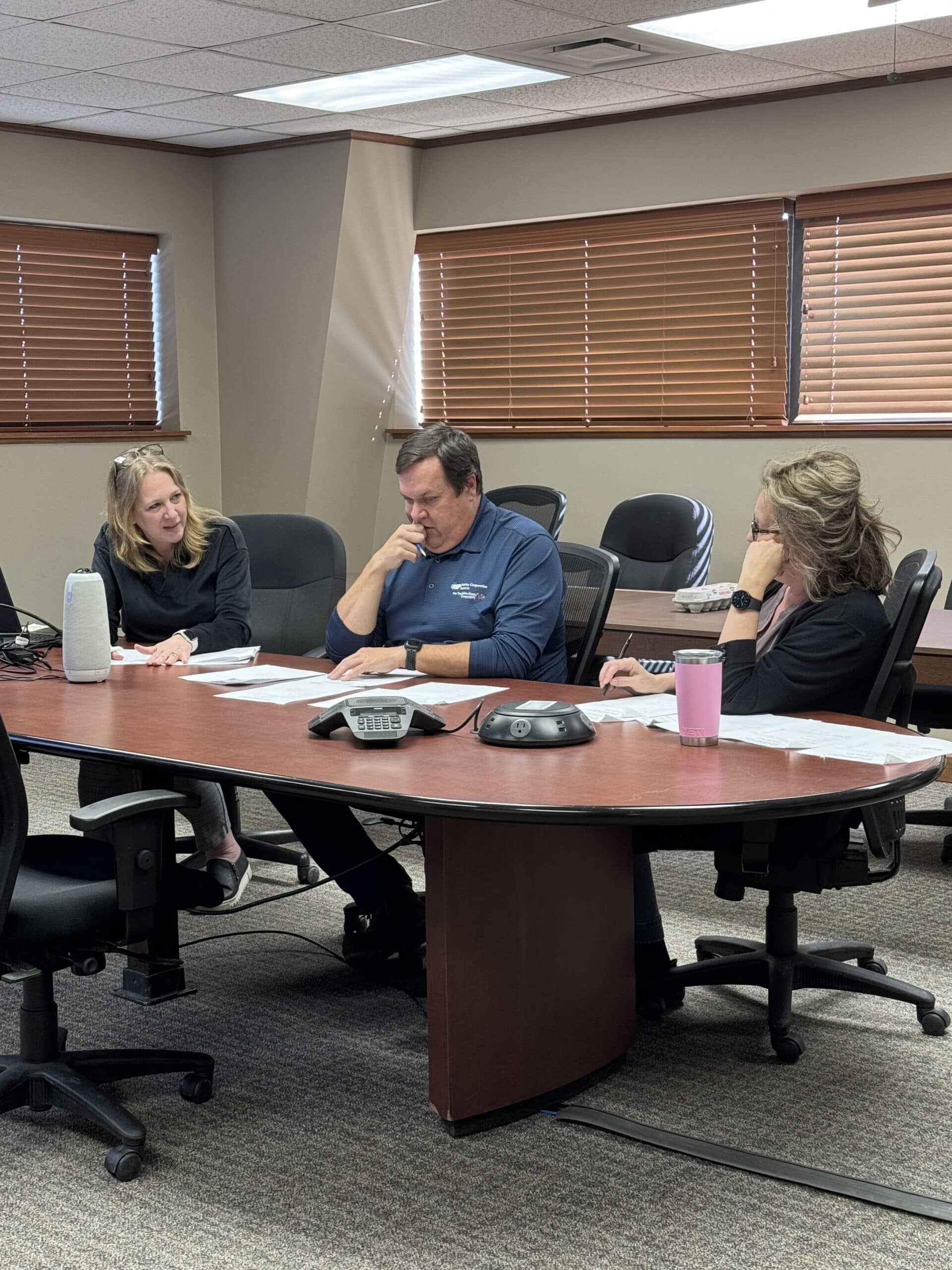 Nobles Cooperative Electric interview committee in deliberation (left to right) Tracey Haberman (Member Services Manager), Adam Tromblay (CEO/General Manager) and Amy Rucker (Executive Assistant)